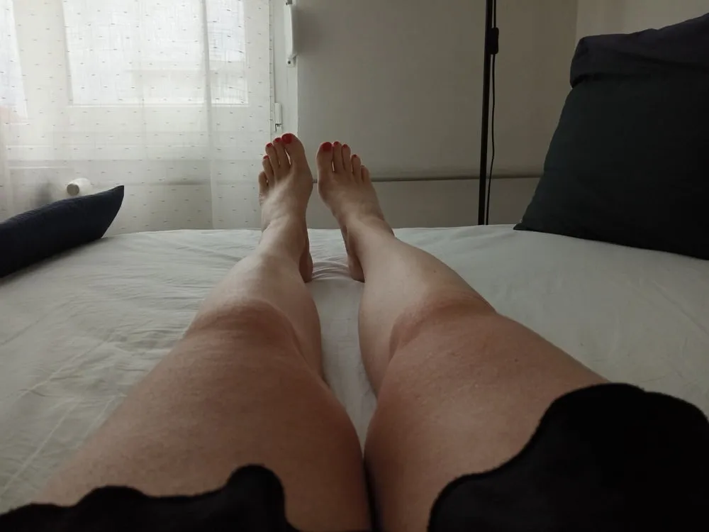 bare smooth slender legs with red painted toes #2