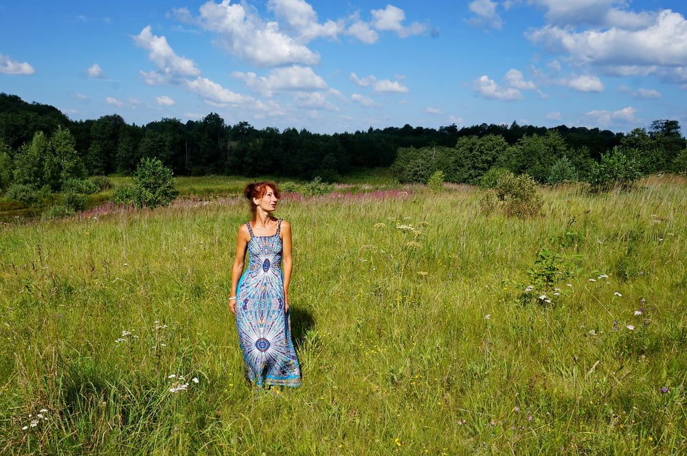 In blue dress in field #14