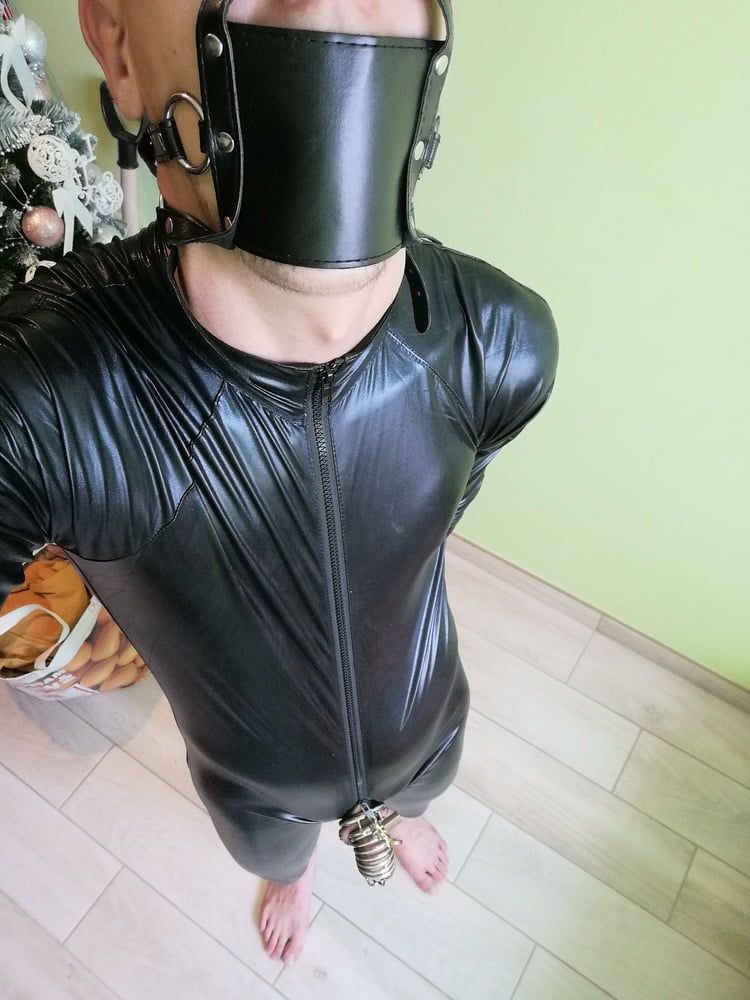 Young slave in latex and chastity cage  #12