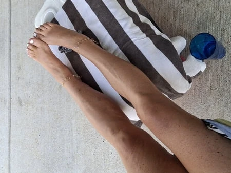 my girls sexy legs and feet in the sun         