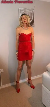    alessia travestita in red velvet dress         