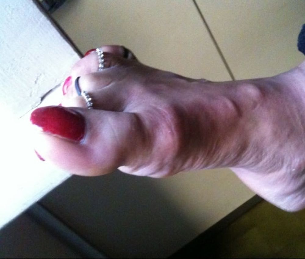 red toenails mix (older, dirty, toe ring, sandals mixed). #2