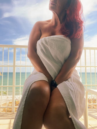 Eva naked on the hotel balcony