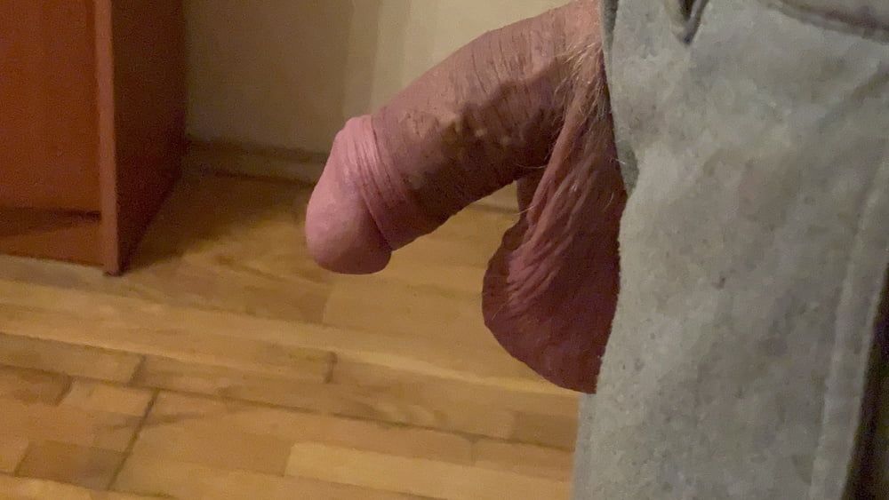 Thick uncut Russian cock hangs out of zipper