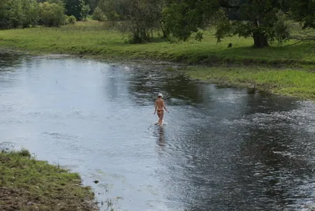 nude in rivers water         