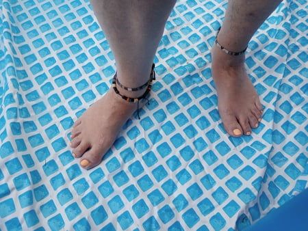 Girlfriends Feet in the pool