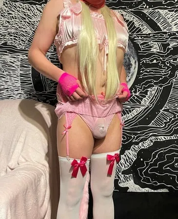 sissy wearing ultra tiny cock cage and lingerie         