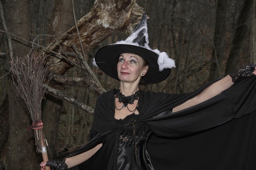 Witch with broom in forest #33