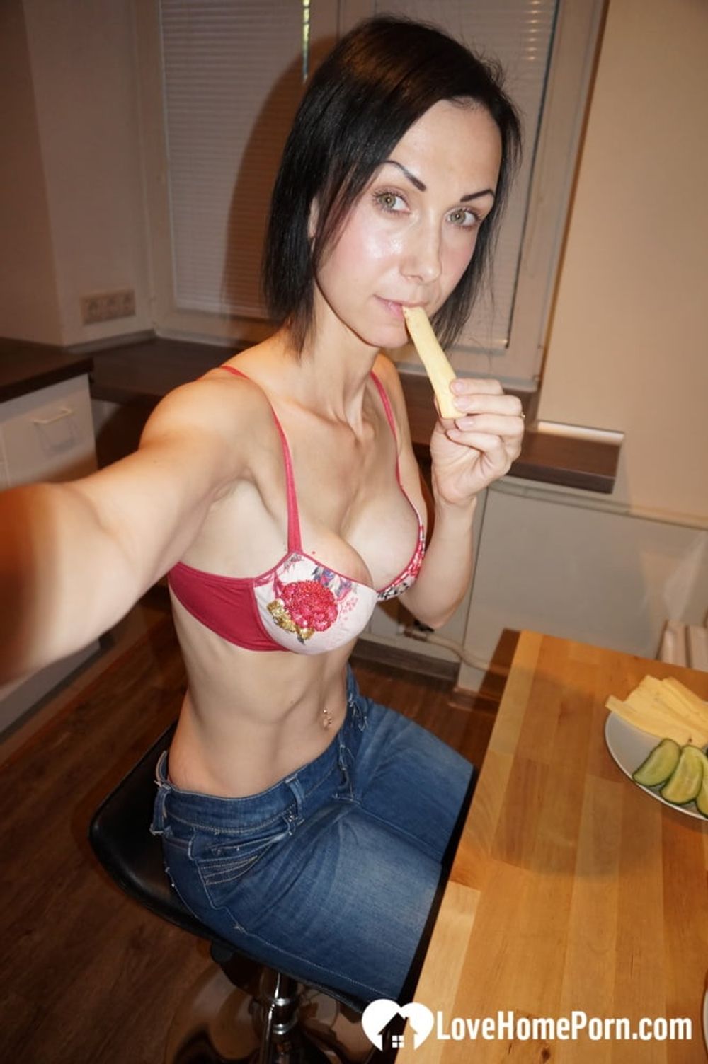 Skinny MILF shows off her fake tits #10