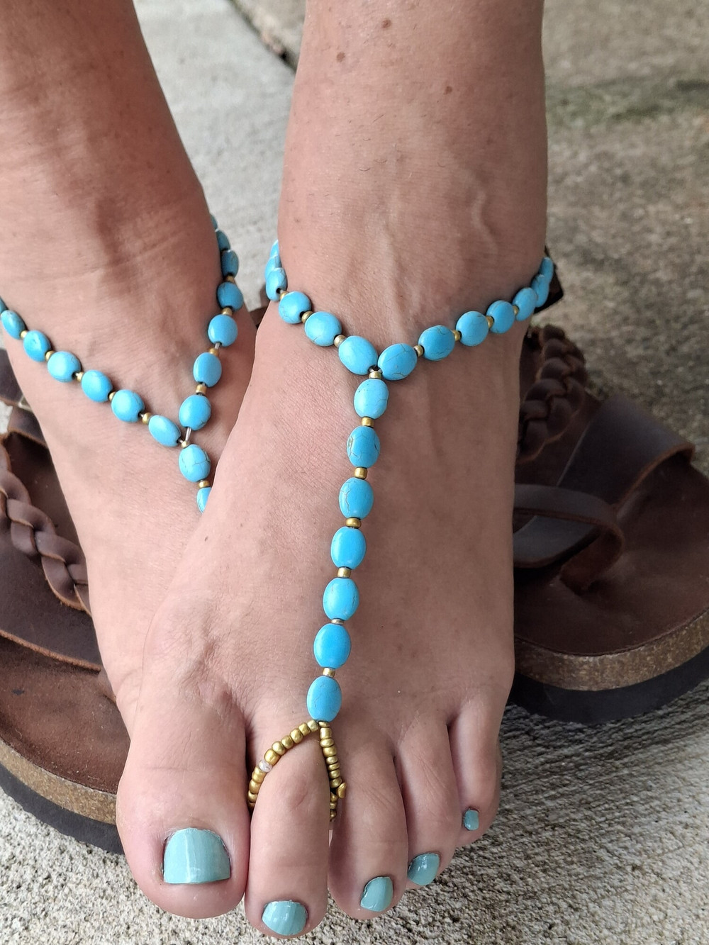 Cute feet wearing barefoot sandals #6
