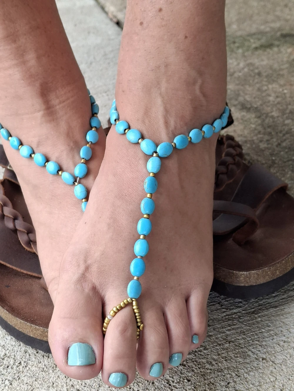 Cute feet wearing barefoot sandals #6