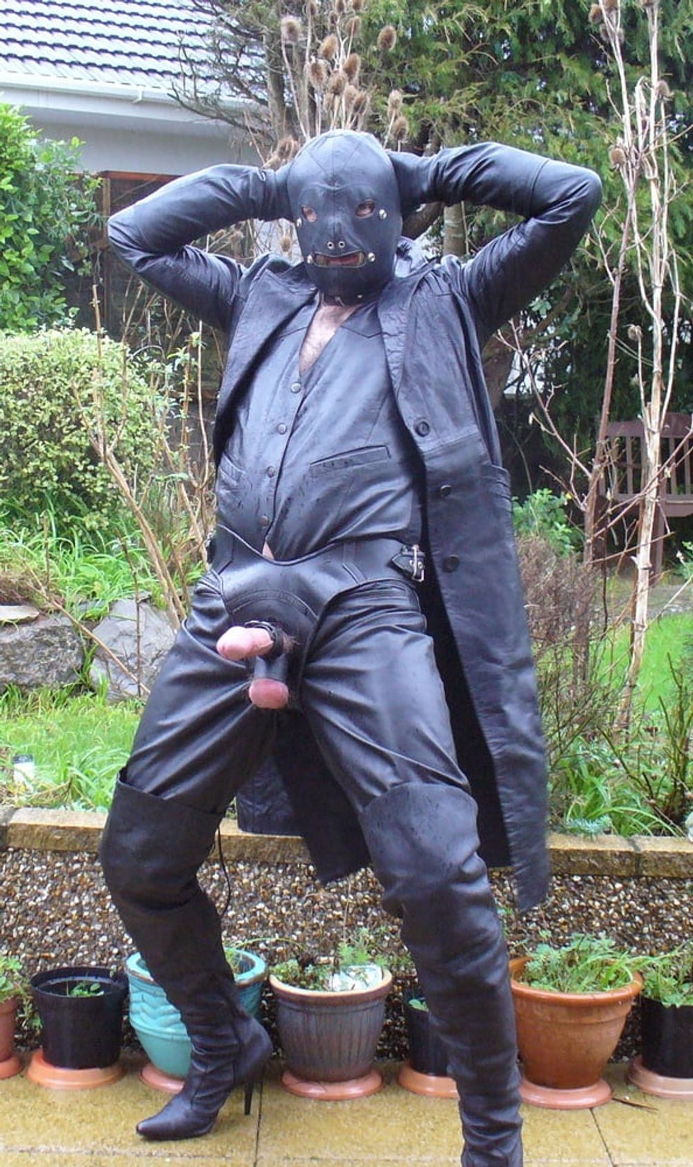 Leather Master in cock harness, boots and hood #5