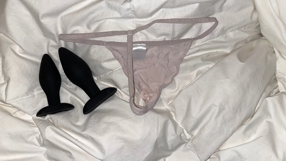 Tiny pink C.K thong and butt plug #5