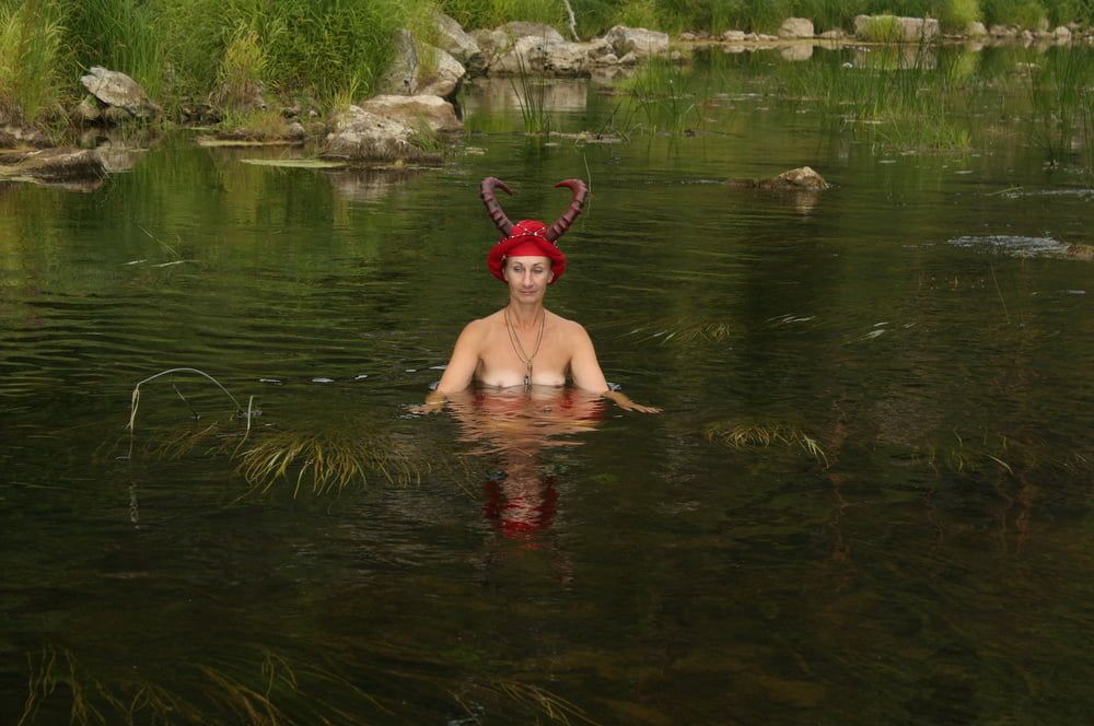 With Horns In Red Dress In Shallow River #22