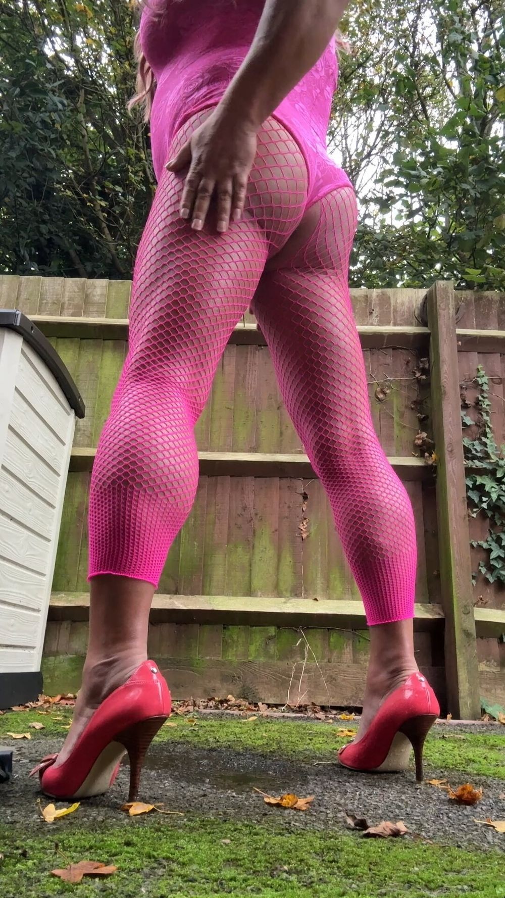 Crossdresser kellycd2022 in pink playsuit and fishnets  #49