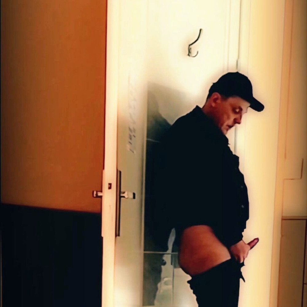 Handjob standing in front of a door #9