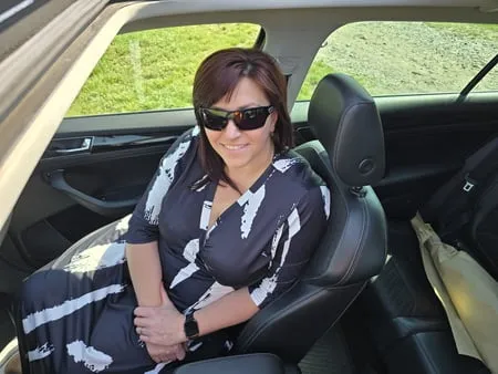 beatiful busty milf in car         