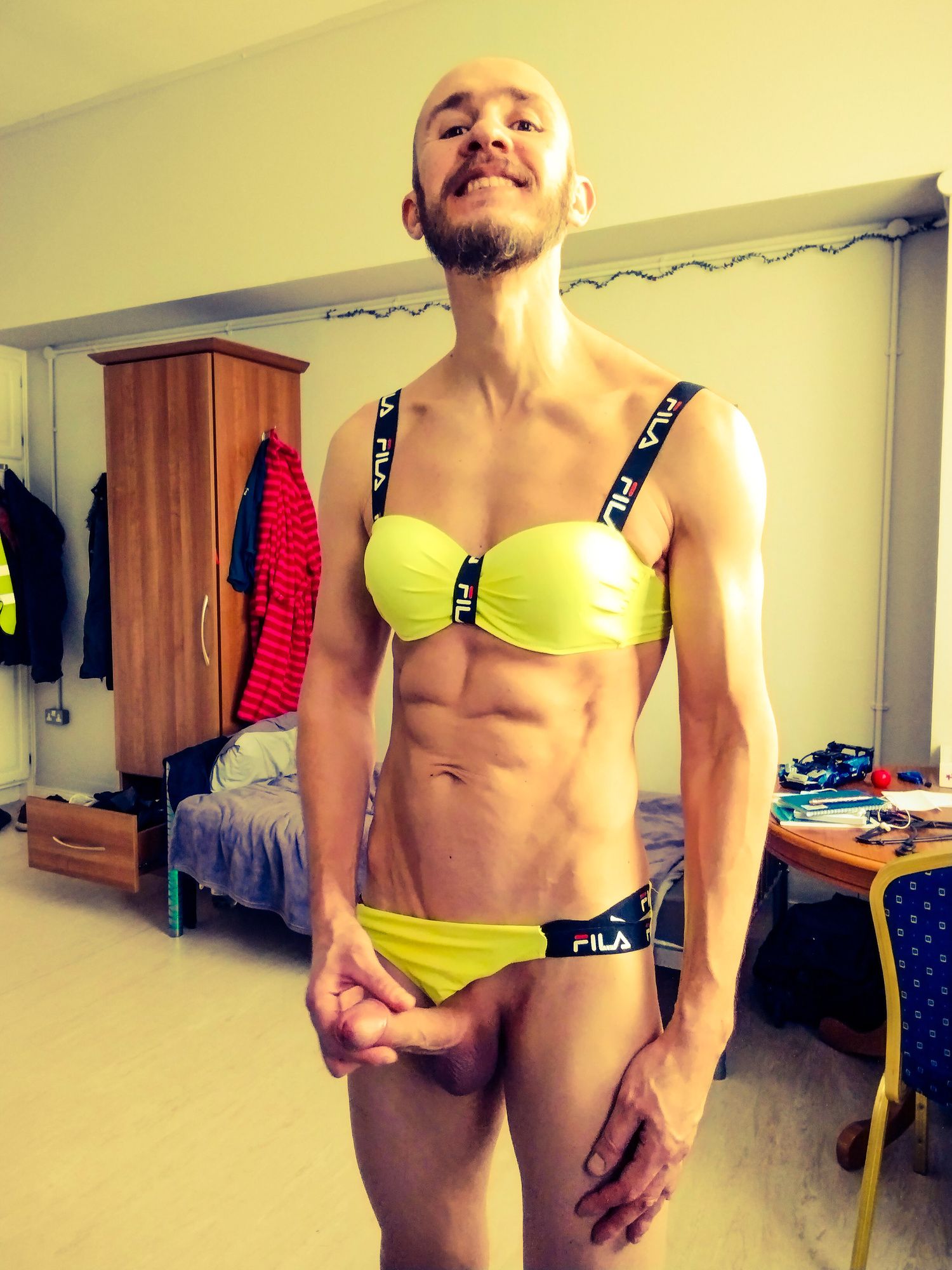 Bearded athletic man posing in yellow swimsuit  #15