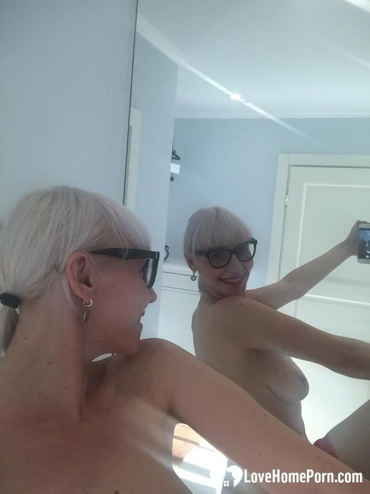 Blonde MILF with glasses teasing with nudes #27