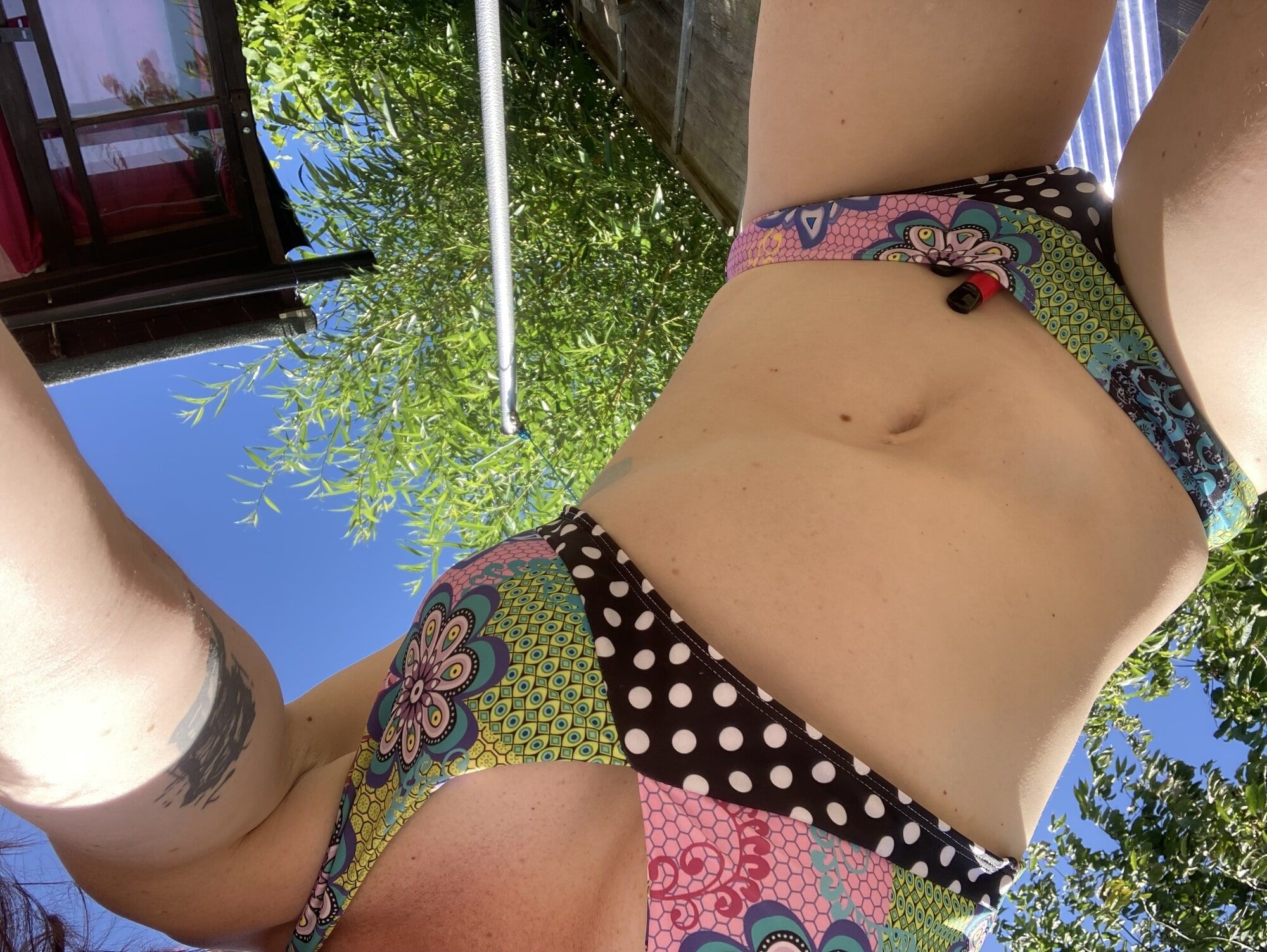 You’re laying in my garden whilst I reach over in a bikini #11