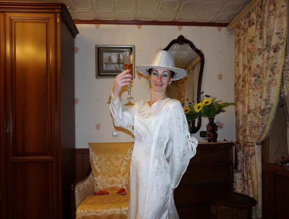 In Wedding Dress and White Hat #5