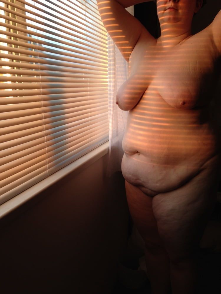 Young BBW by window evening sunset #4