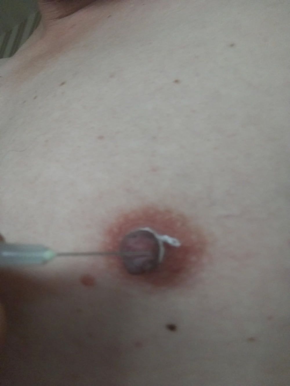 some more needles in my nipples #8