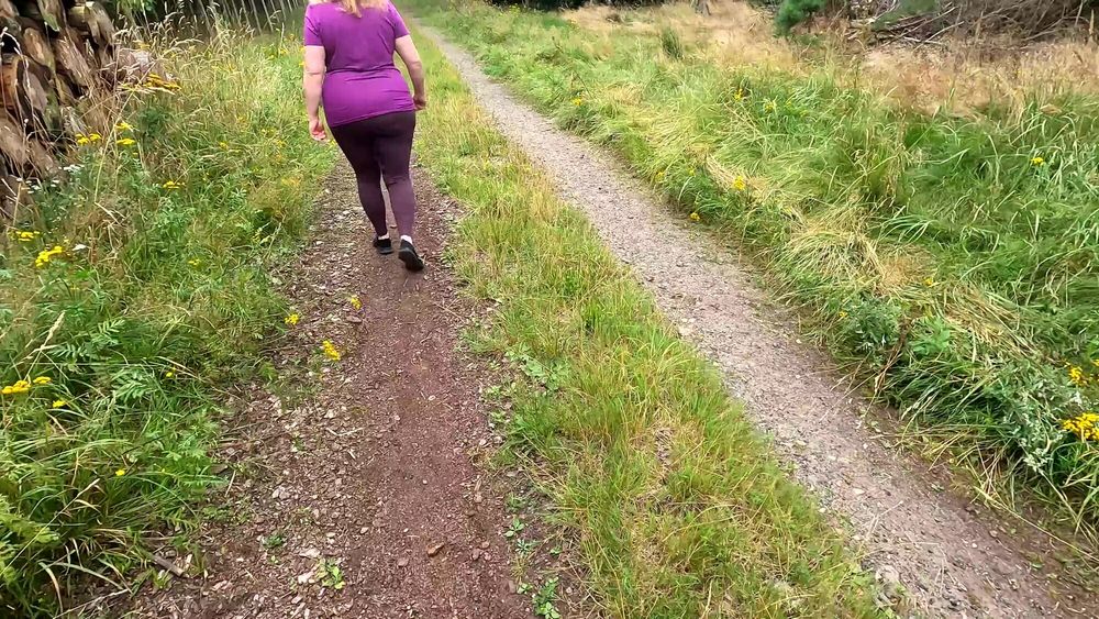 Slapping her cunt and tits while hiking