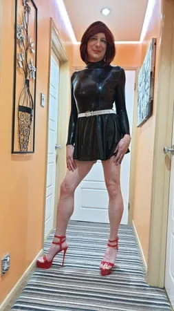 sissy lucy in latex skater dress and chastity         