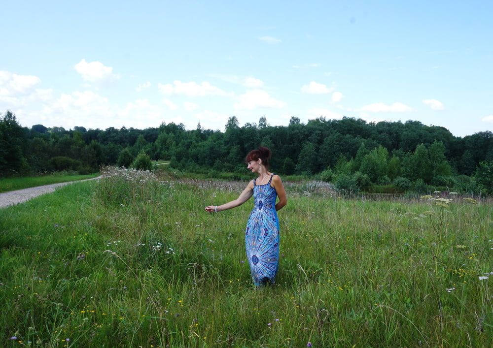 In blue dress in field #43