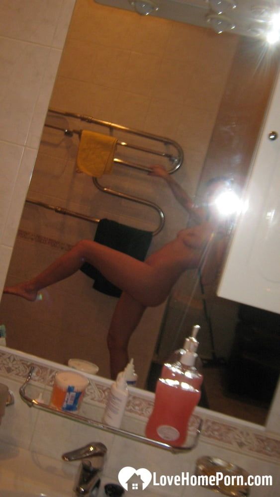 Innocent brunette teasing in her own bathroom #14