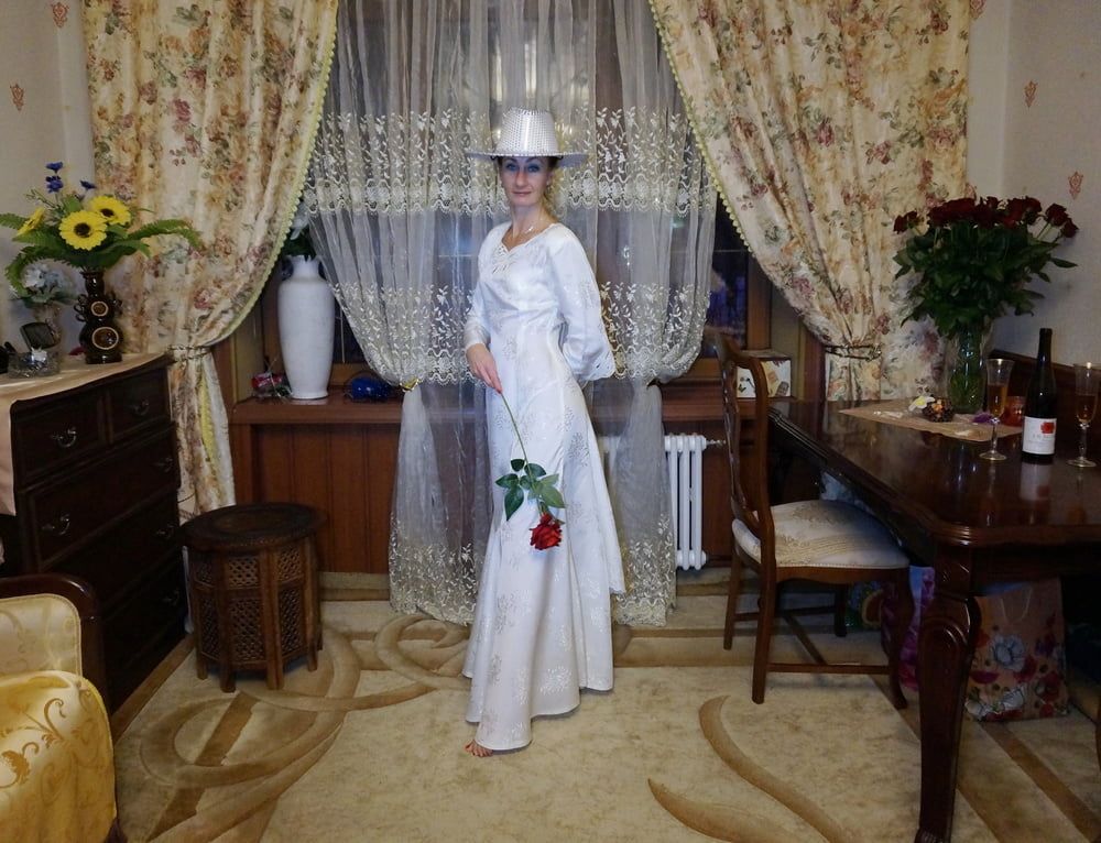 In Wedding Dress and White Hat #28