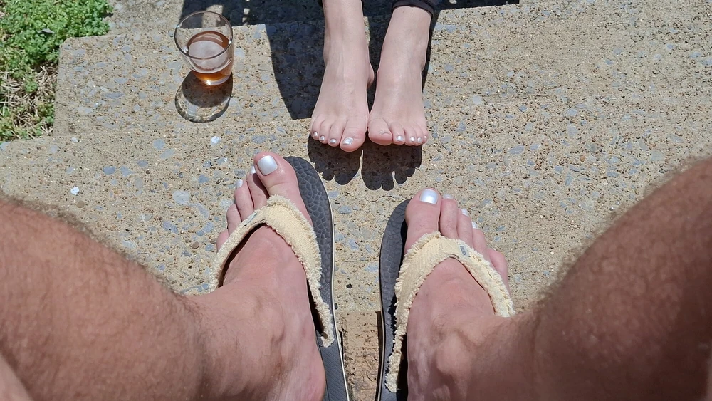 Relaxing outside showing our pedicured and painted toes #23