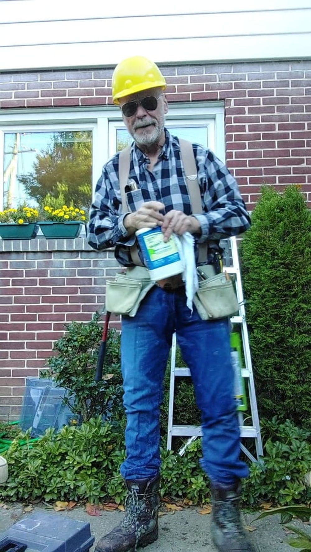 Construction dad inspecting windows #3