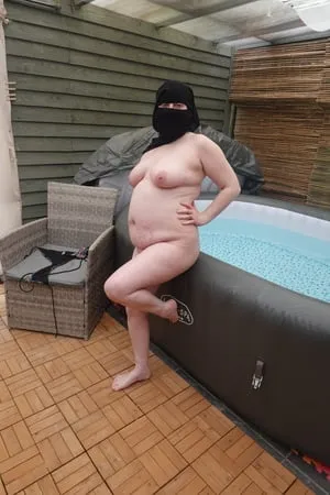 wife showing off big breasts and ass in niqab         