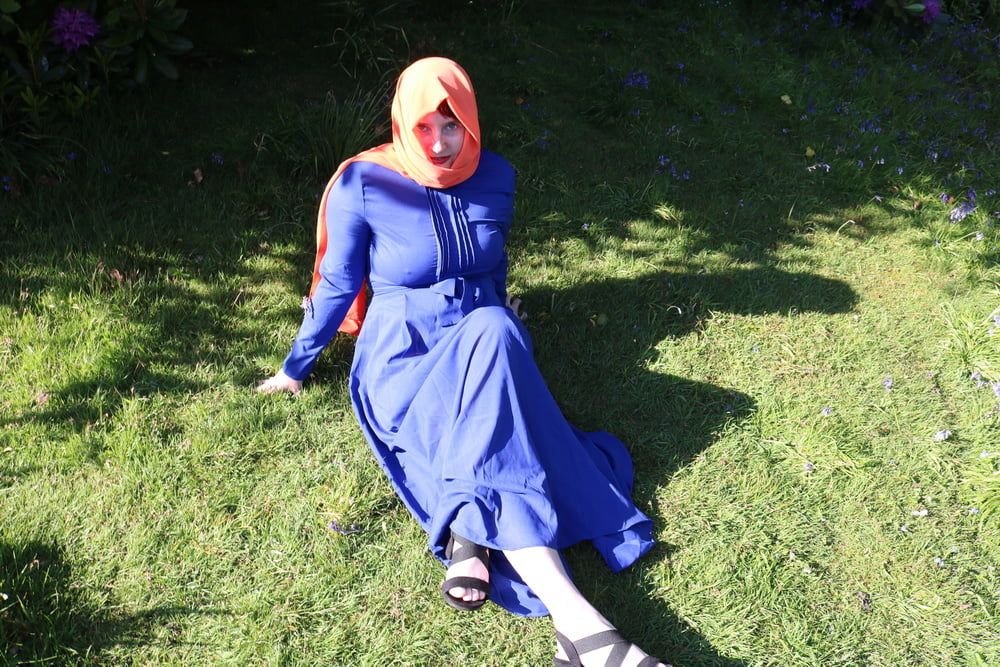 hijab and abaya flashing outdoors #6