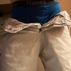 Dad lowers his shorts